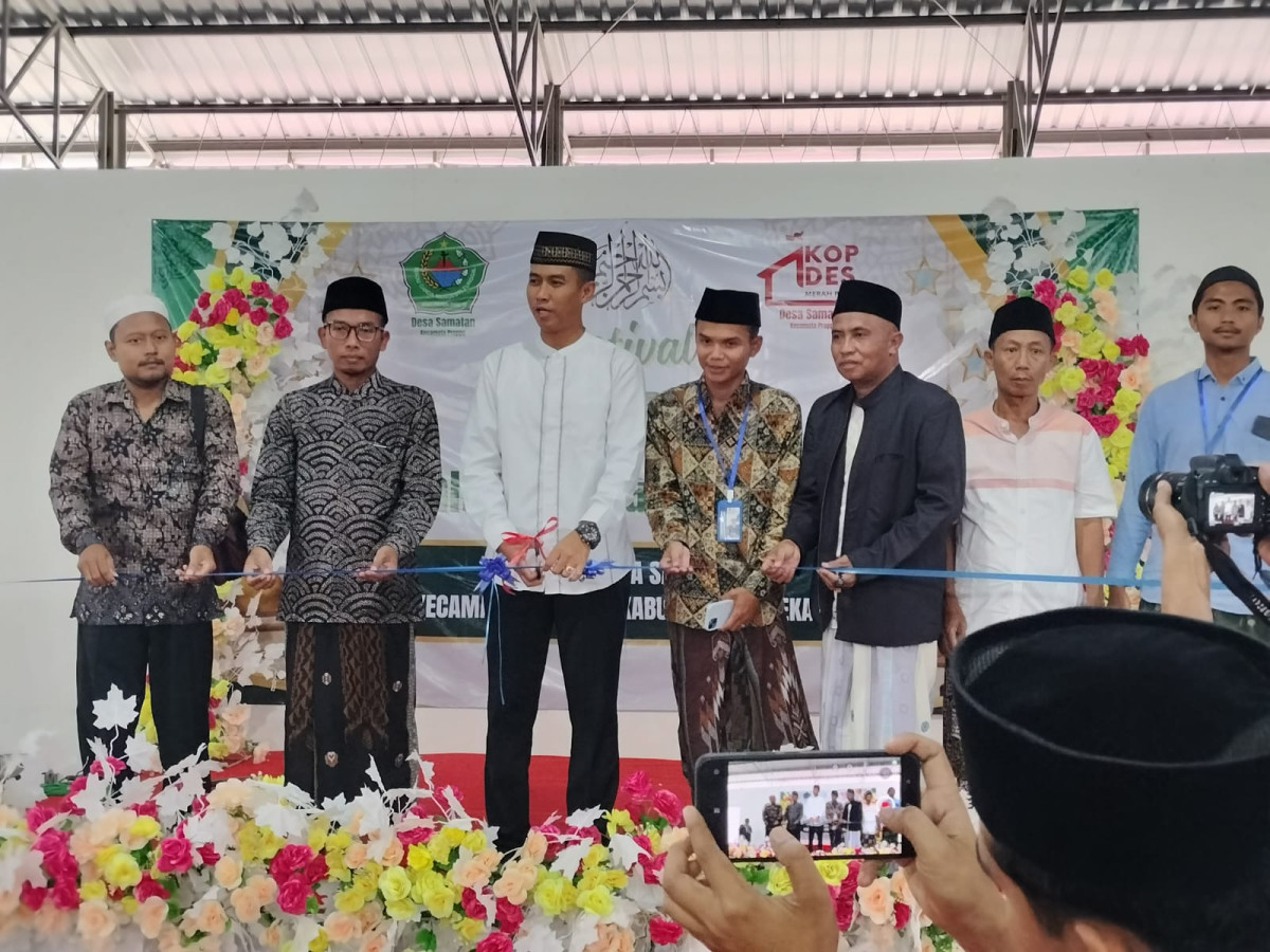 Foto: Komandan Kodim 0826/Pamekasan Letkol Kav Agus Wibowo Hendratmoko, S.H., M.Han., secara simbolis melakukan pemotongan pita sebagai tanda dibukanya Lomba Tahfidz Al-Qur’an dan Festival Bazar Ramadhan 